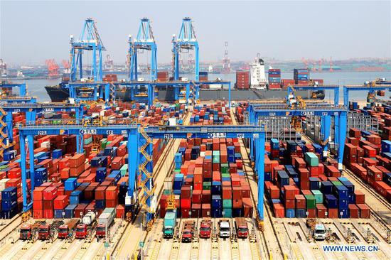 China's exports jump 11.4% in October, imports grow moderat